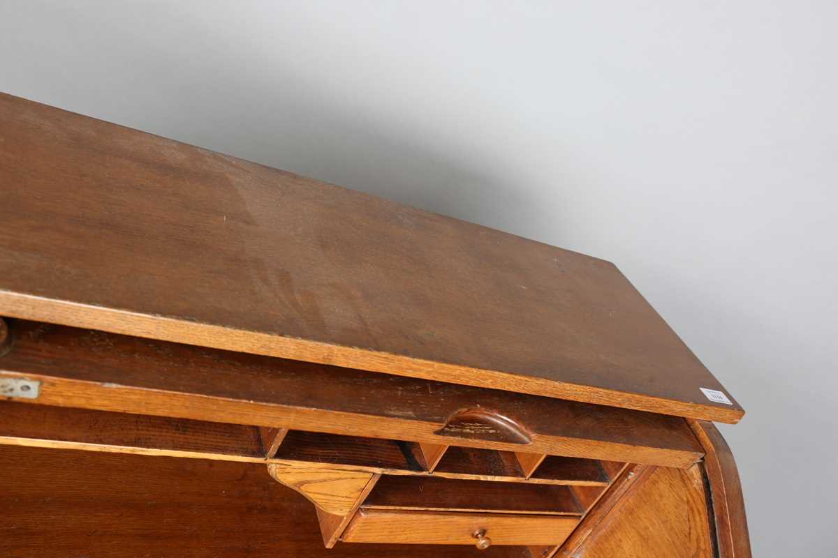 An Art Deco oak roll-top desk, fitted with an arrangement of drawers, height 114cm, width 150cm, - Image 7 of 12