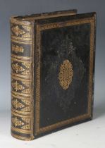 A late Victorian gilt-tooled leather family bible with interior monochrome plates, height 32cm.