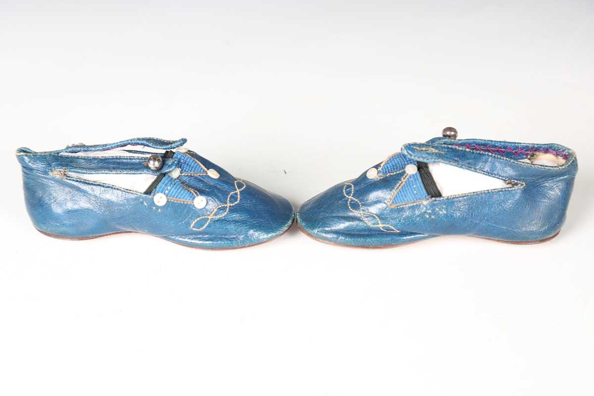 A pair of 19th century blue leather infant's shoes with applied mother-of-pearl buttons and polished - Image 6 of 8
