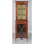An Edwardian mahogany corner display cabinet with inlaid decoration, height 188cm, width 61cm.