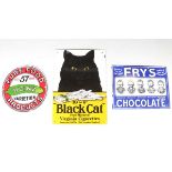 A group of eight reproduction enamel advertising signs, including Black Cat Virginia Cigarettes,