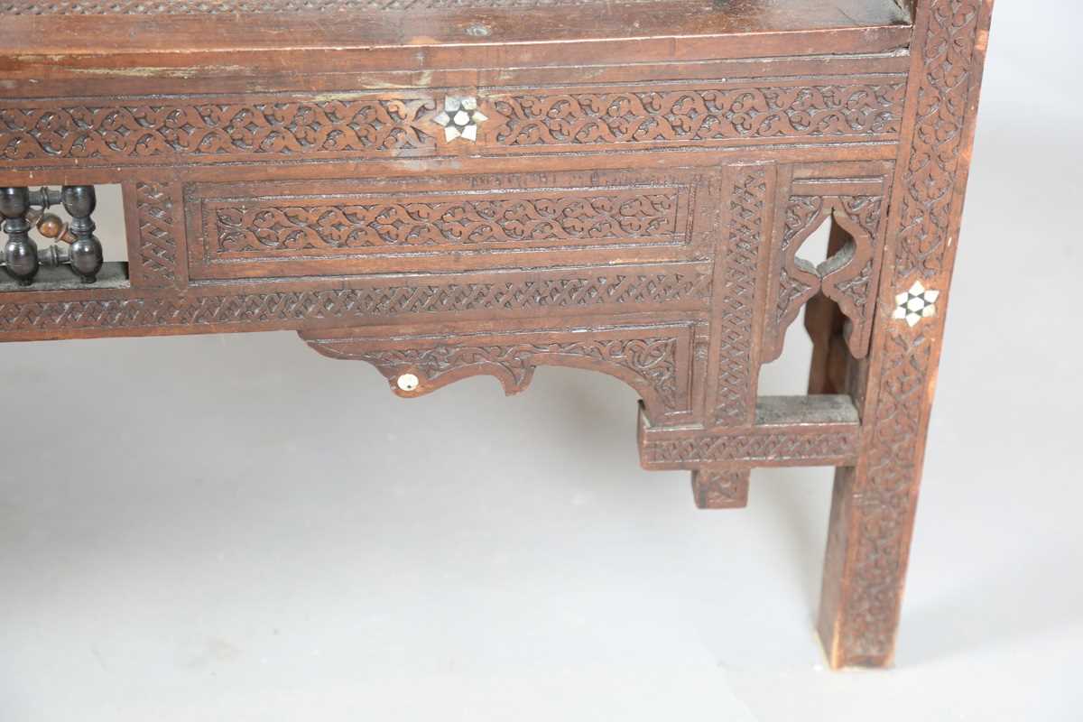A late 19th century Middle Eastern hardwood and mother-of-pearl inlaid window seat, similar to those - Image 9 of 19