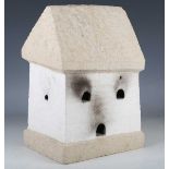 Miles Bodimeade - a modern carved stone sculpture of stylized house form, width 23cm. Provenance: