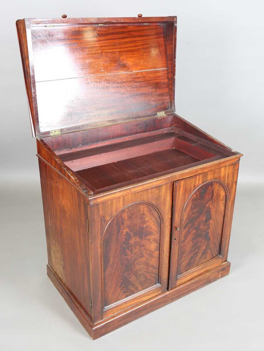 An early Victorian mahogany wash cabinet, fitted with a hinged lid above two arch panelled doors, - Image 6 of 14