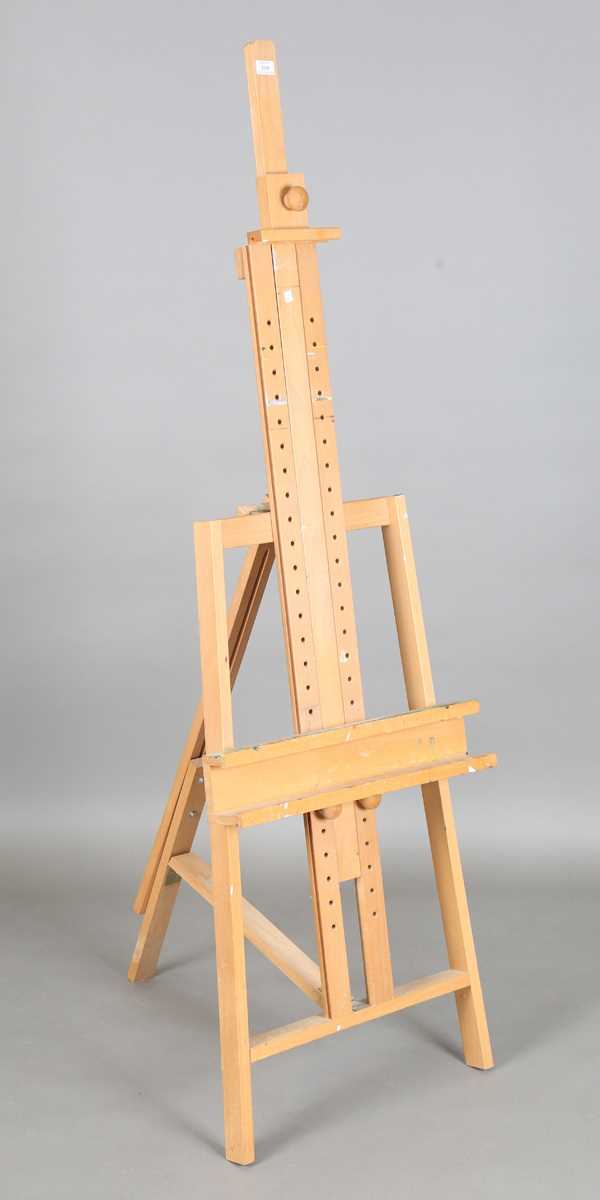 A modern beech artist's easel, height 180cm. Provenance: collection of notable Arundel based