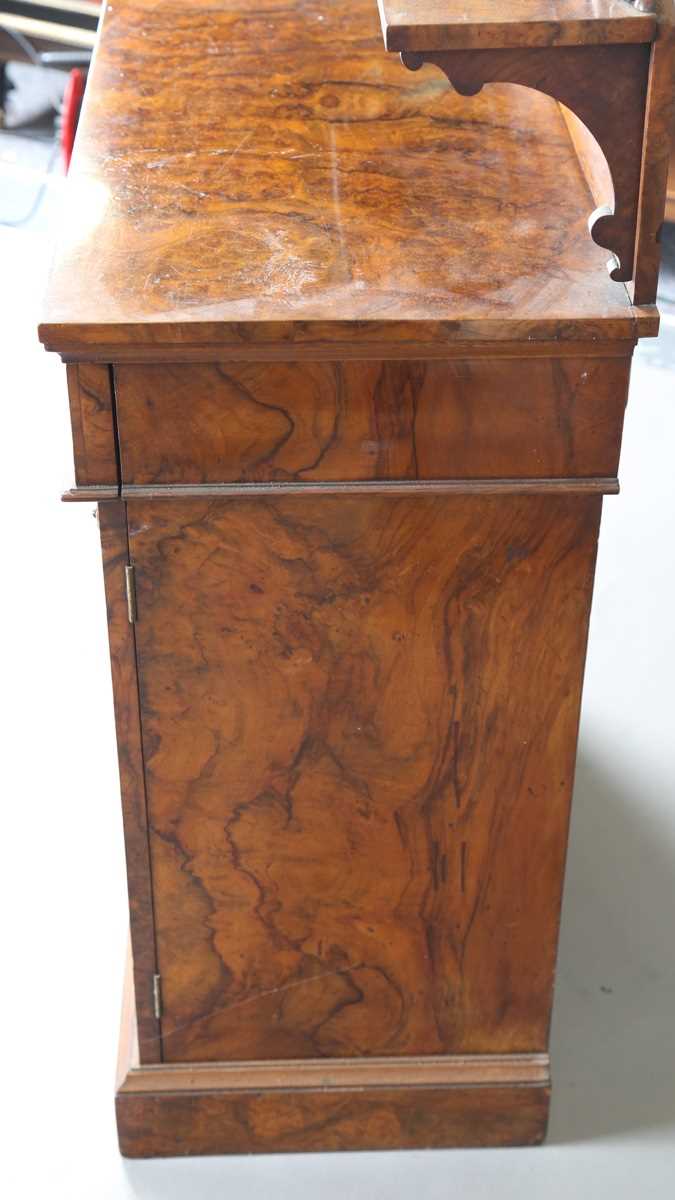 A Victorian burr walnut chiffonier, the shelf back above a drawer and a pair of mirrored doors, on a - Image 9 of 9