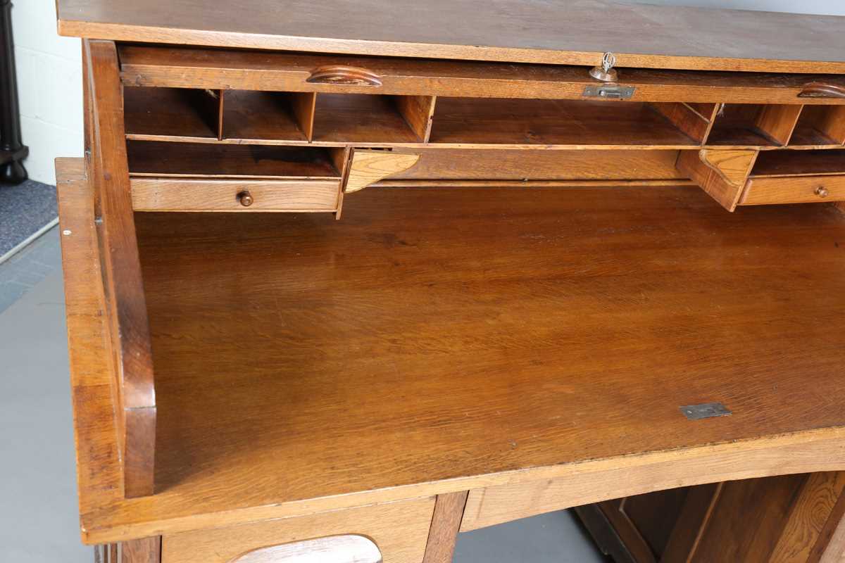 An Art Deco oak roll-top desk, fitted with an arrangement of drawers, height 114cm, width 150cm, - Image 2 of 12