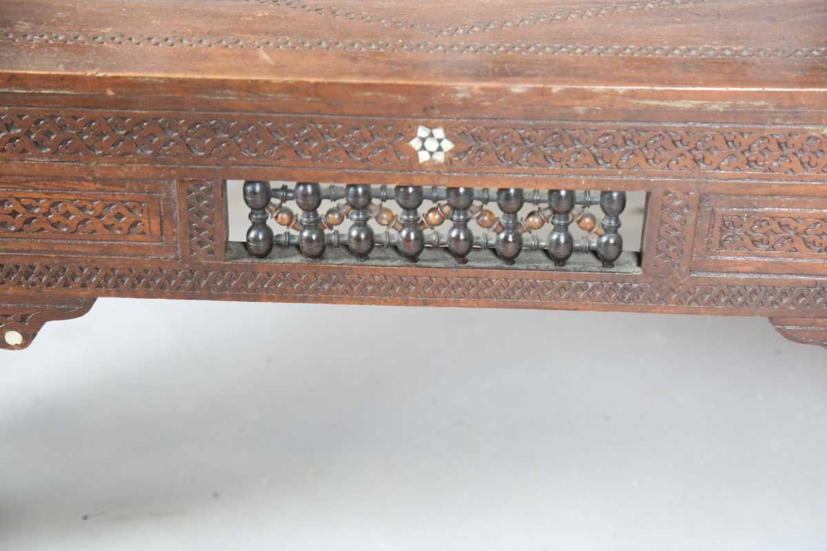 A late 19th century Middle Eastern hardwood and mother-of-pearl inlaid window seat, similar to those - Image 10 of 19