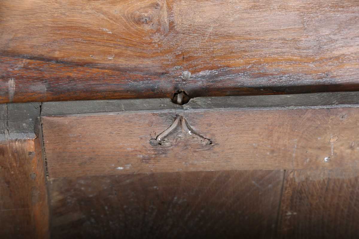 A 17th century oak panelled coffer, the lid with original wire hinges, height 71cm, width 125cm, - Image 7 of 17