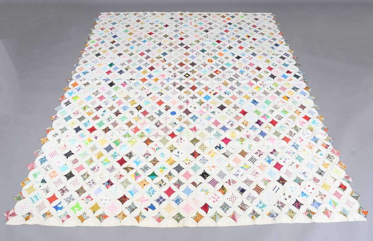 A mid-20th century 'Cathedral Window' cotton patchwork quilt, 230cm x 193cm.