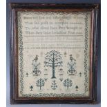 A George III needlework sampler by Lucy Smith, dated 1802, finely worked with Adam and Eve beside