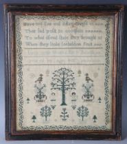 A George III needlework sampler by Lucy Smith, dated 1802, finely worked with Adam and Eve beside