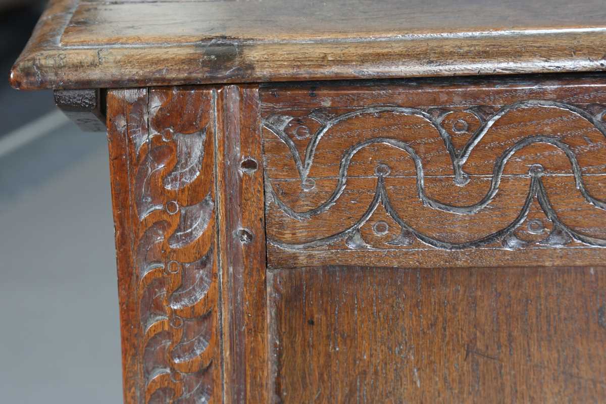 A 17th century oak panelled coffer, the lid with original wire hinges, height 71cm, width 125cm, - Image 11 of 17