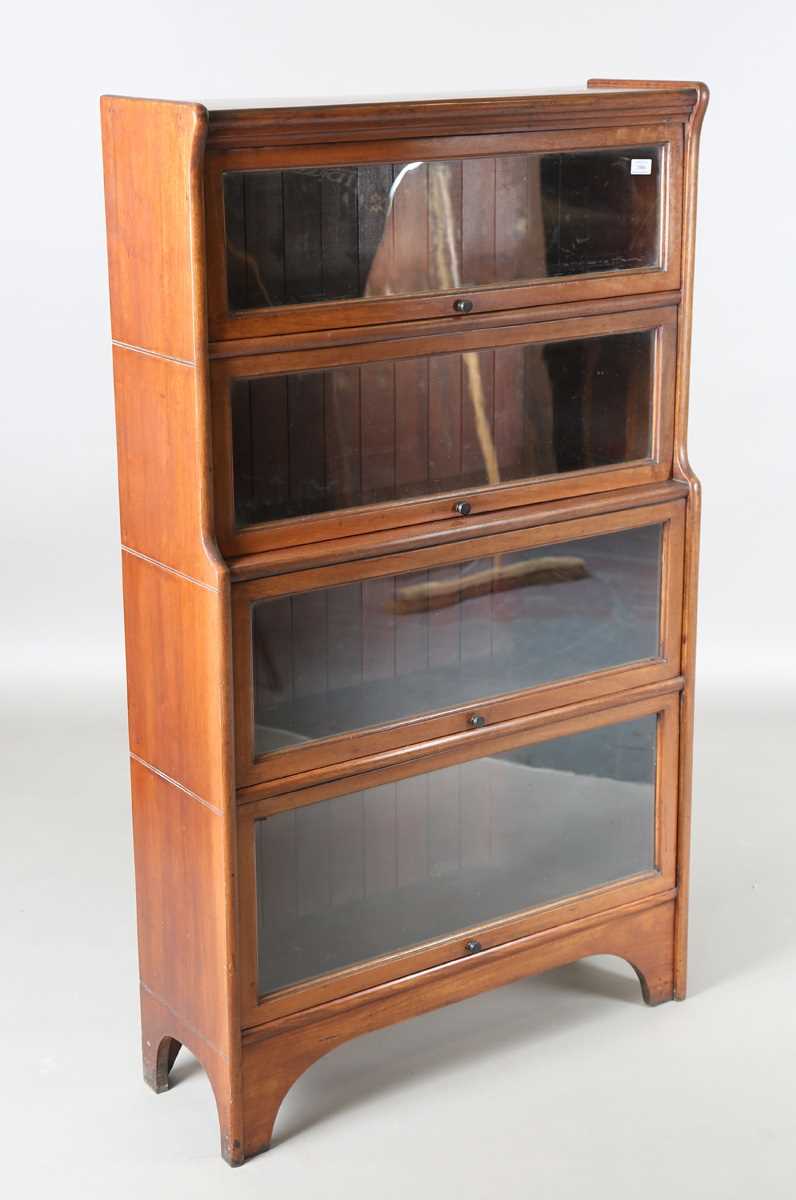 A mid-20th century walnut Globe Wernicke style glazed bookcase by Kenric & Jefferson, height