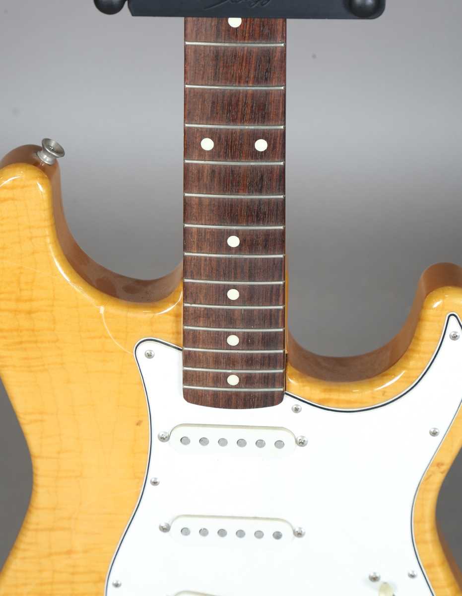 A Fender Stratocaster MIJ electric guitar, serial No. 5006278 (surface cracks to varnish). - Image 3 of 10