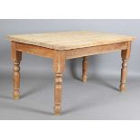 A 20th century Victorian style washed pine kitchen table, on turned legs, height 78cm, length 152cm,