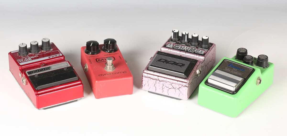 An Ibanez TS 9 Tube Screamer guitar effects pedal, an MXR Dyna Comp pedal, a Dod FX53 Classic Tube