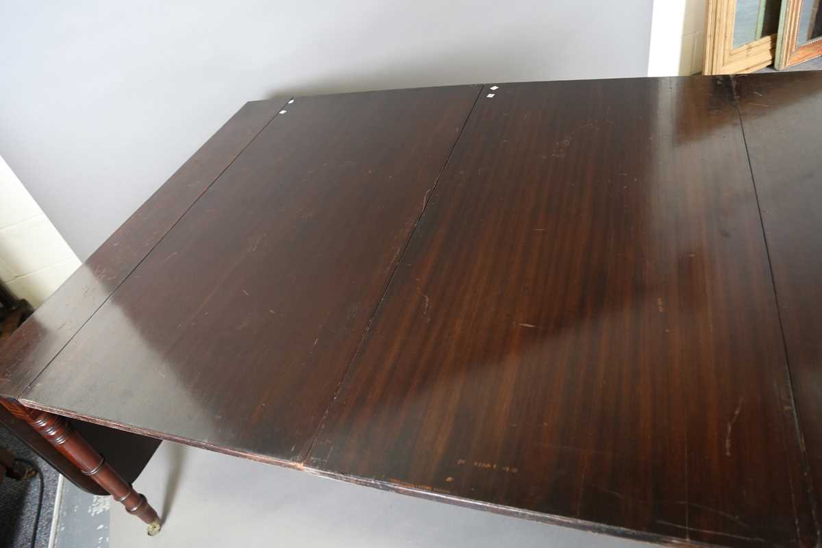 A Regency mahogany concertina-action extending dining table, in the manner of Wilkinson of - Image 12 of 16