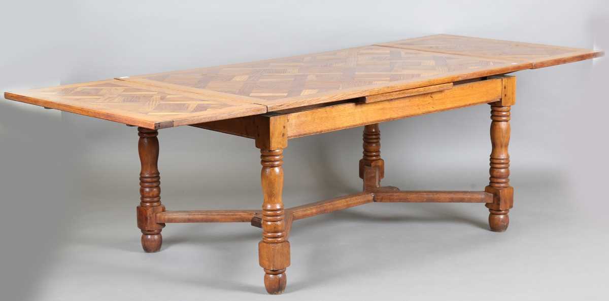 A 20th century French parquetry oak draw-leaf dining table, on turned legs, height 75cm, length - Image 2 of 10