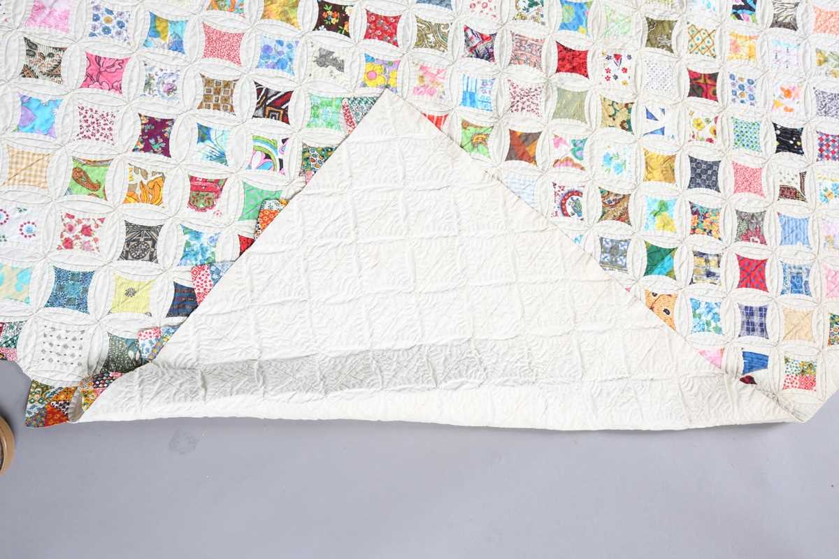 A mid-20th century 'Cathedral Window' cotton patchwork quilt, 230cm x 193cm. - Image 9 of 9