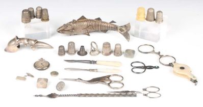 A mixed group of silver and other objects of virtu, including an articulated fish with hinged lid,