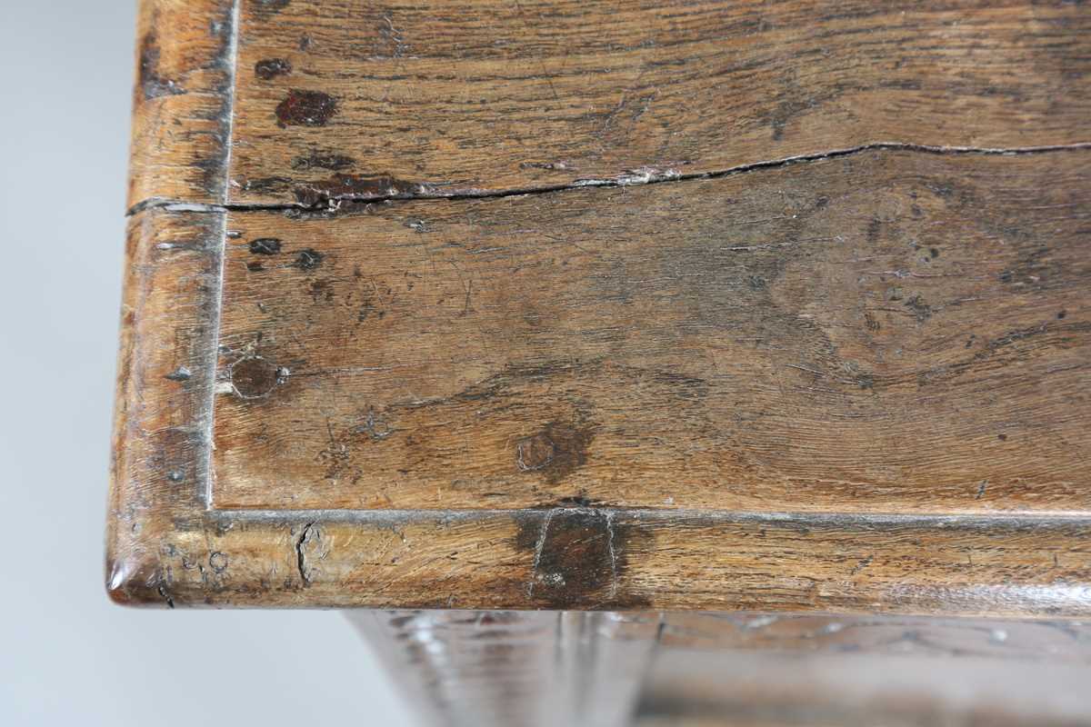 A 17th century oak panelled coffer, the lid with original wire hinges, height 71cm, width 125cm, - Image 3 of 17