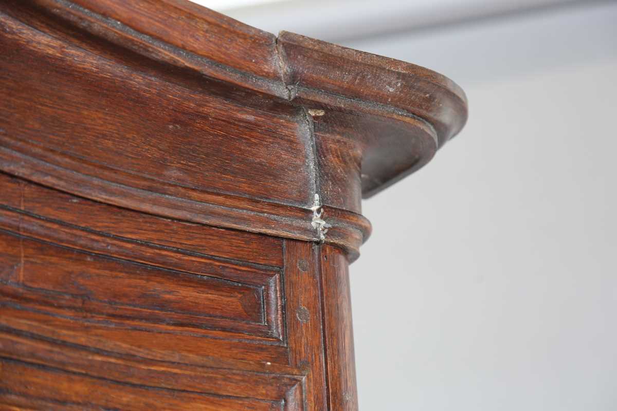 A 19th century French oak side cabinet with an arched pediment and four carved panel doors, height - Image 3 of 14