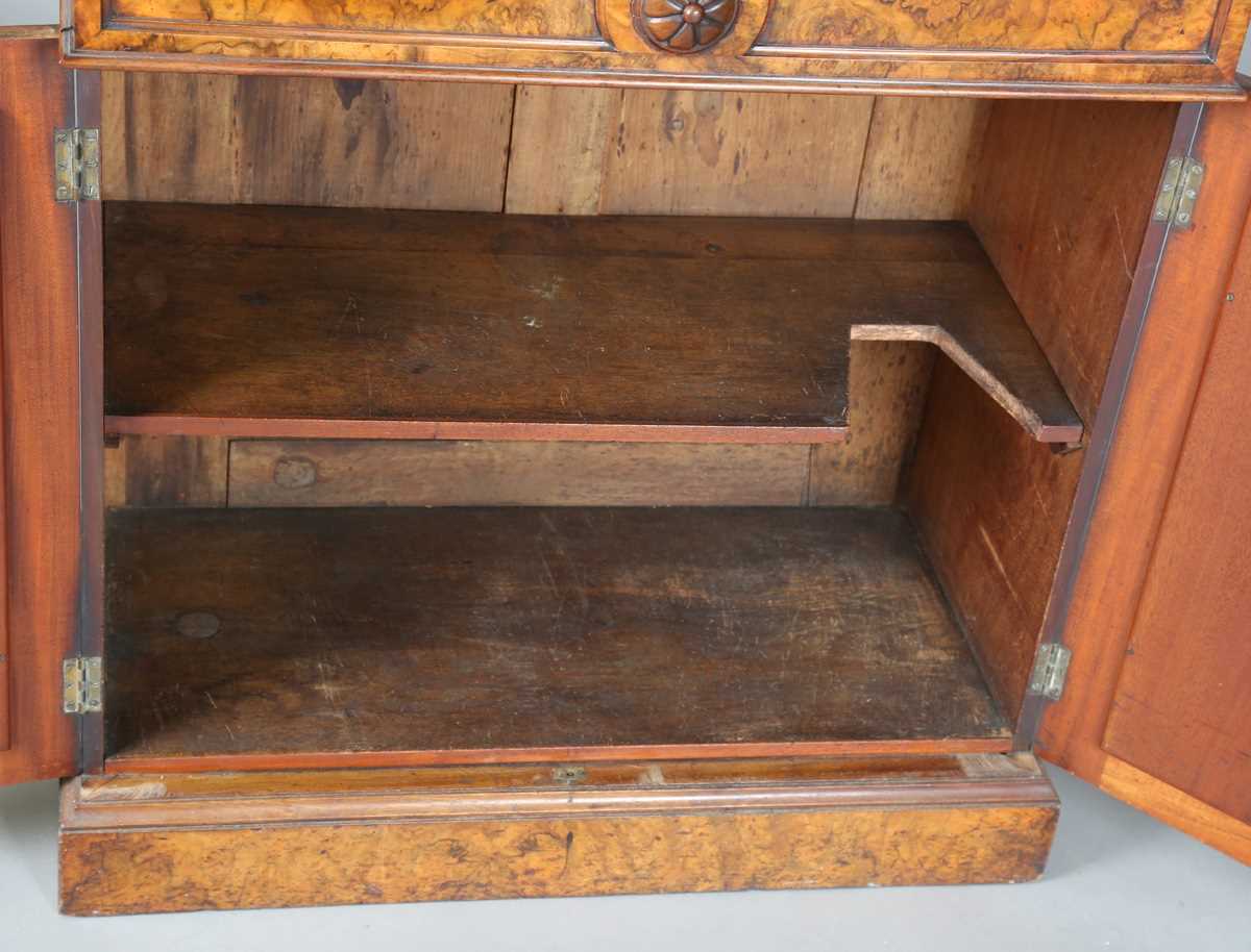 A Victorian burr walnut chiffonier, the shelf back above a drawer and a pair of mirrored doors, on a - Image 6 of 9