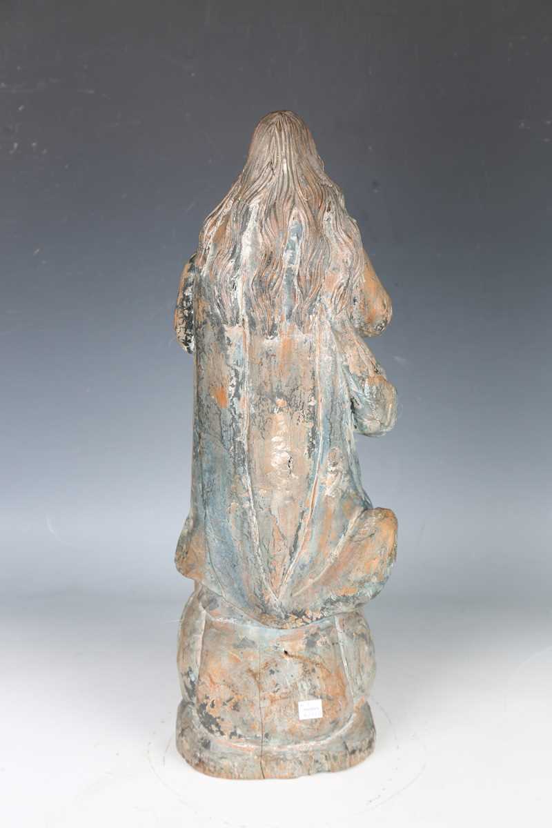 A 20th century carved wooden figure of a standing saint, height 51cm. - Image 10 of 18