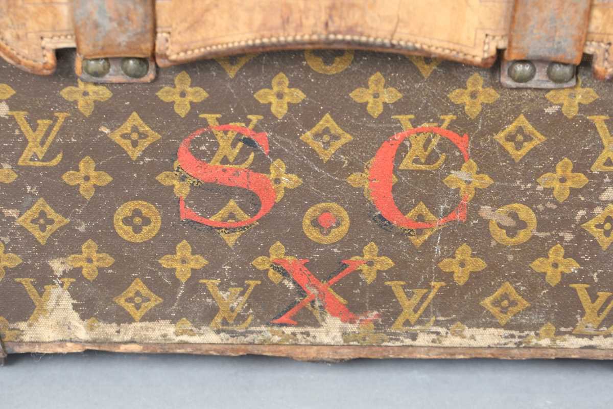 An early 20th century Louis Vuitton travelling trunk with overall monogram canvas covering and tan - Image 36 of 42