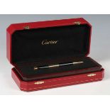 A Cartier limited edition perpetual calendar ballpoint pen, the finial inset with glazed
