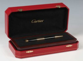 A Cartier limited edition perpetual calendar ballpoint pen, the finial inset with glazed