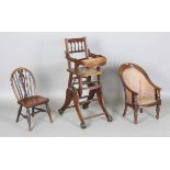A 19th century child’s beech and elm Windsor chair, on turned legs united by stretchers, height