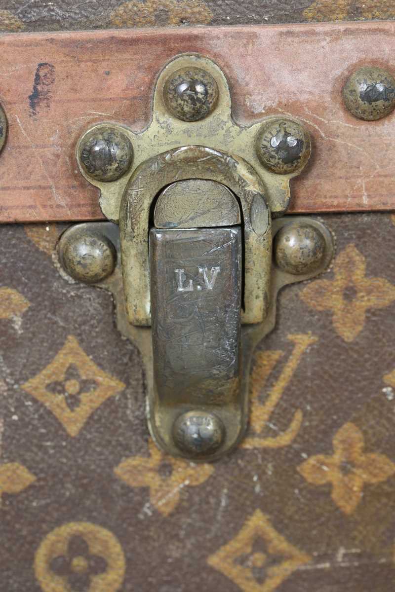 An early 20th century Louis Vuitton travelling trunk with overall monogram canvas covering and tan - Image 6 of 42