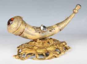 A late 19th century gilt metal and horn desk stand, inset with a citrine-coloured and clear stone,