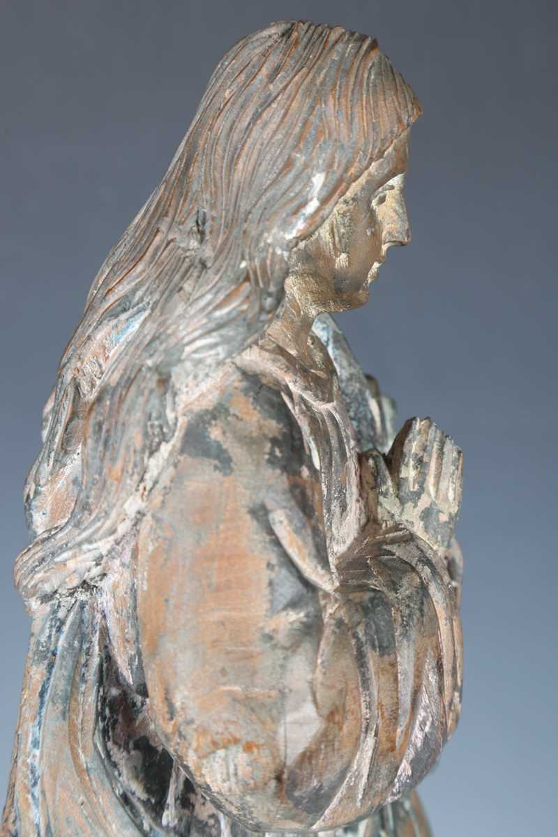 A 20th century carved wooden figure of a standing saint, height 51cm. - Image 8 of 18