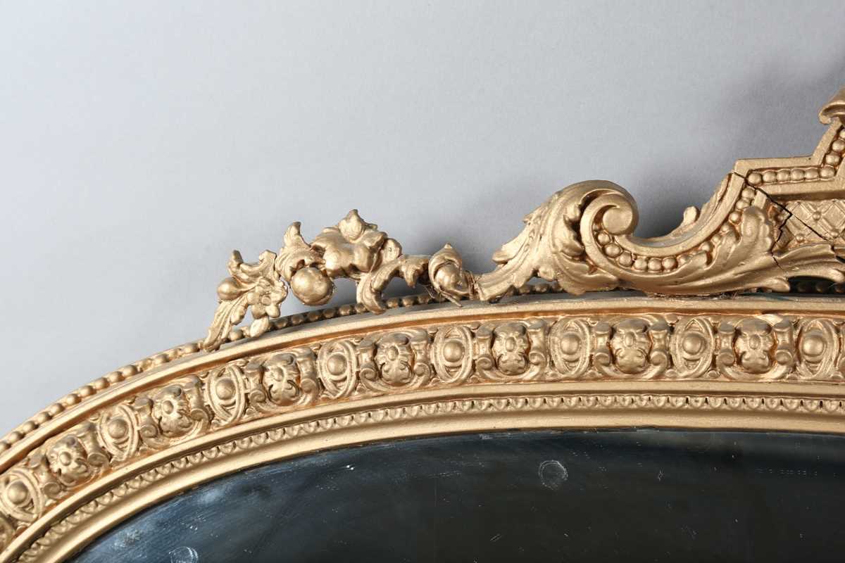 A late Victorian gilt painted overmantel mirror with foliate mouldings, height 150cm, width 112cm. - Image 4 of 11