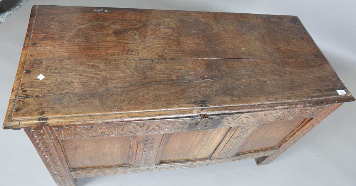 A 17th century oak panelled coffer, the lid with original wire hinges, height 71cm, width 125cm, - Image 2 of 17