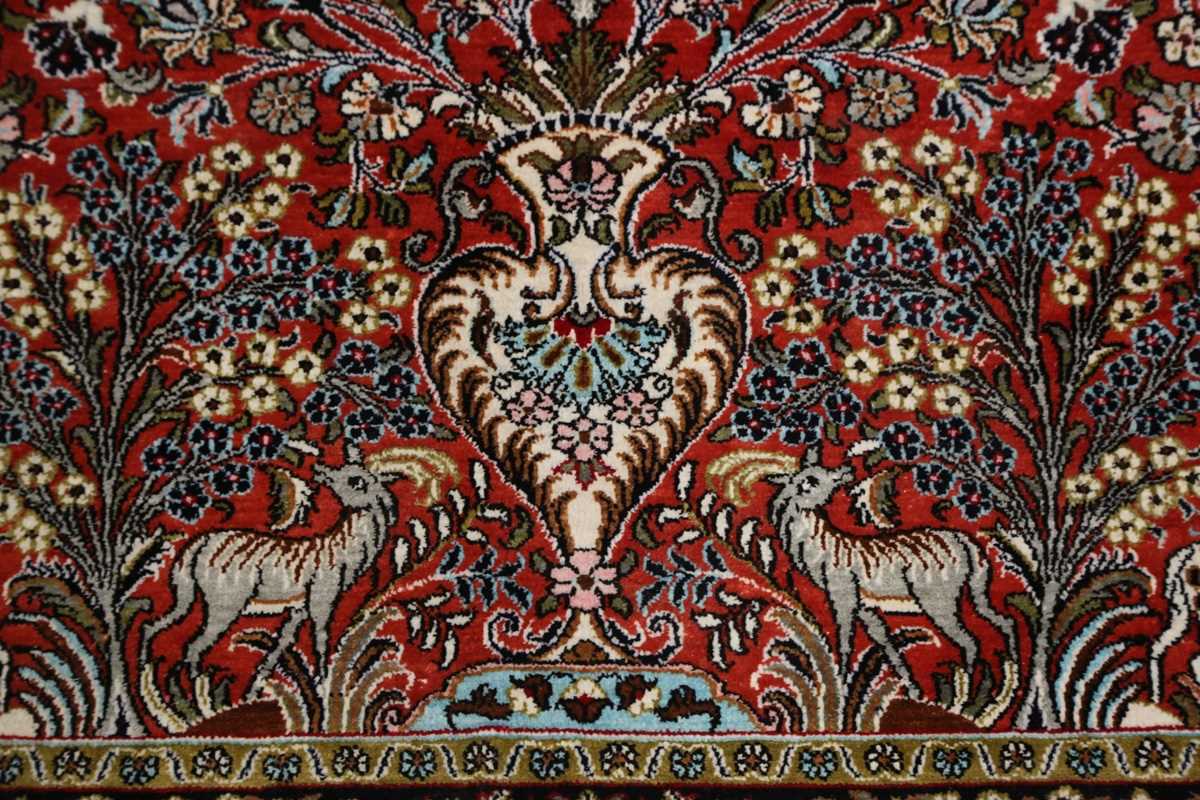 A Qum part silk prayer rug, Central Persia, late 20th century, the red mihrab with an ascending vase - Image 5 of 6