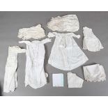 A collection of whitework, including a Victorian linen broderie anglaise bonnet, various linen gowns