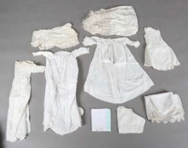 A collection of whitework, including a Victorian linen broderie anglaise bonnet, various linen gowns