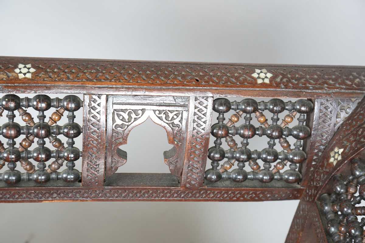 A late 19th century Middle Eastern hardwood and mother-of-pearl inlaid window seat, similar to those - Image 4 of 19