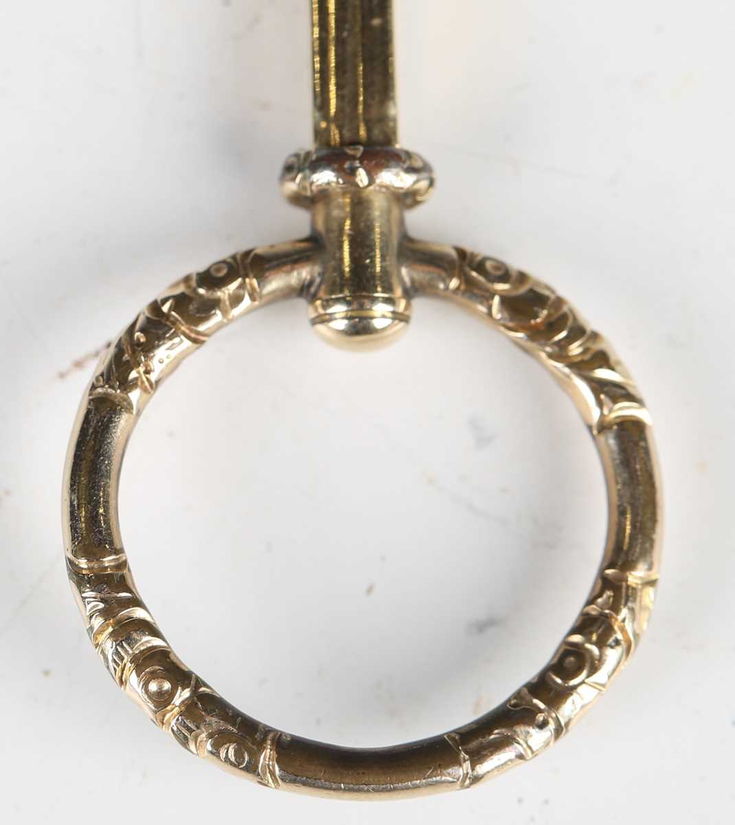 A mid-19th century gold framed magnifying lens, finely chased with foliage, length 8cm. - Image 7 of 12