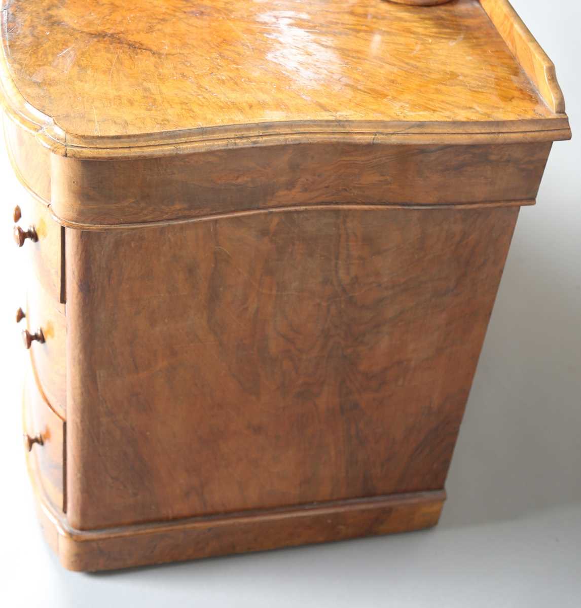 A mid-Victorian burr walnut kneehole dressing table, fitted with a swing mirror above an arrangement - Image 11 of 13