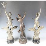 A pair of late 19th century French cast spelter figures representing day and night, raised on titled
