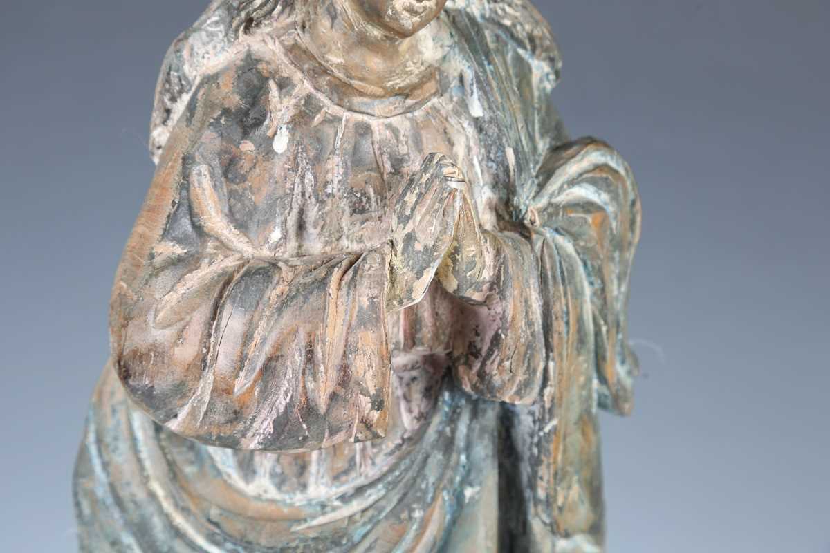 A 20th century carved wooden figure of a standing saint, height 51cm. - Image 3 of 18