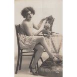 A collection of approximately 170 postcards of erotic or risqué interest, many collected in sets.