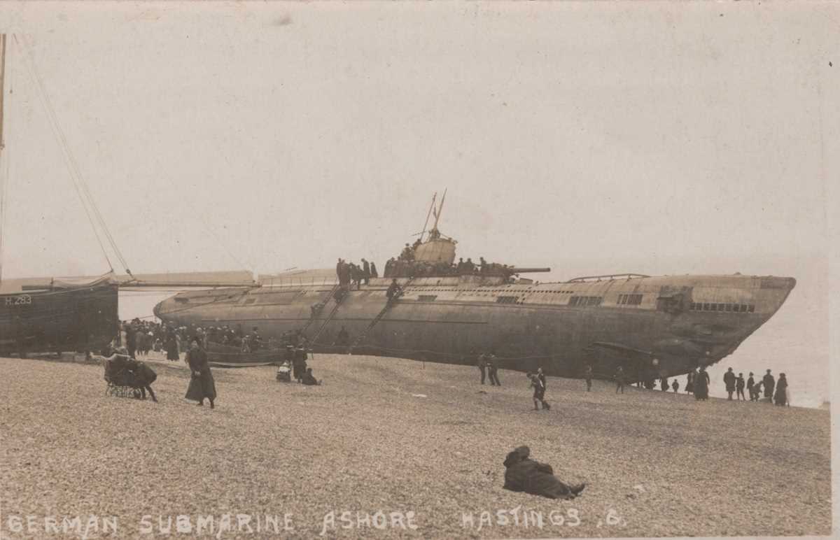 A collection of 13 postcards of Sussex including photographic postcards titled ‘German Submarine - Image 4 of 5