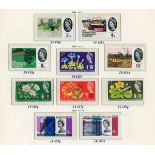 Great Britain decimal mint stamps in three albums and two stock books plus loose in envelopes with