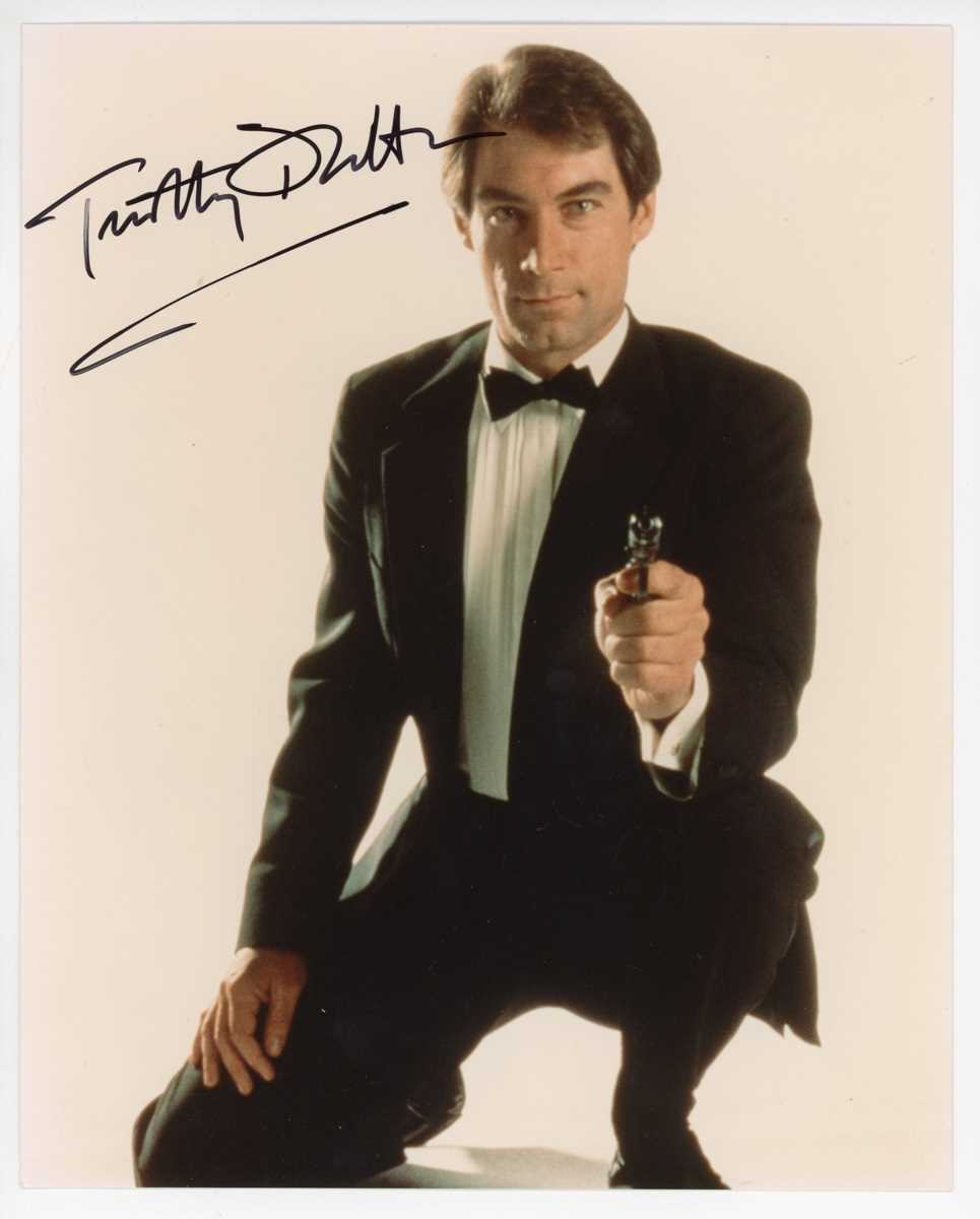 AUTOGRAPHS, JAMES BOND 007. A group of six signed photographs of actors who have played James - Image 4 of 6